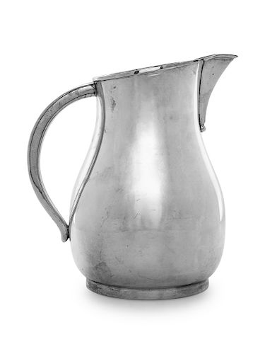 An American Silver Water Pitcher
J.C. Boardman & Co., South Wallingford, CT, 20th Century, retailed by Cartier
of handled form.