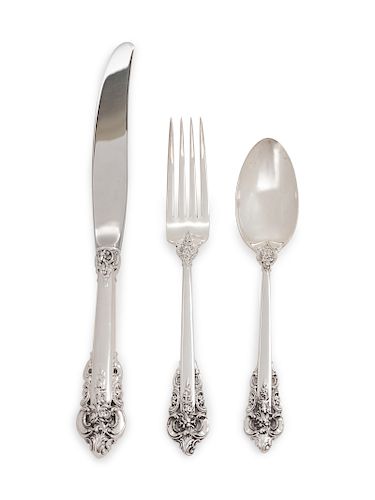 An American Silver Partial Flatware Service
R. Wallace & Sons Mfg. Co., Wallingford, CT
Grand Baroque pattern, comprising: 11 dinner knives with stain