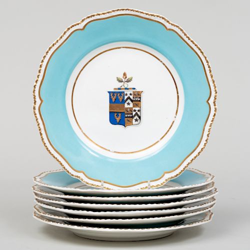 Set of Seven English Turquoise Ground Porcelain Armorial Plates