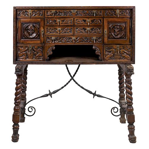 VARGUENO. SPAIN, BEGINNING OF THE 20TH CENTURY. Carved wood. With two frontal doors and ten drawers. 55.5 x 51 x 21.6 in