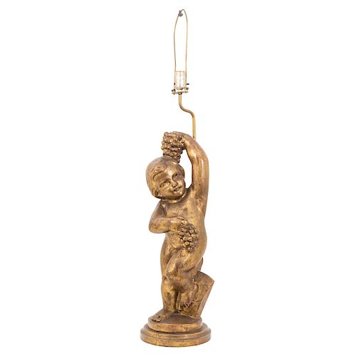 TABLE LAMP. MEXICO, BEGINNING OF THE 20TH CENTURY. Gilt wood with golden details. Electrified for one light. Decored with the figure of an infant. 39.