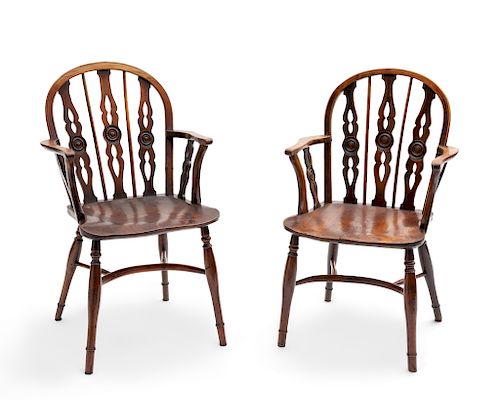A pair of George III yewwood Windsor armchairs