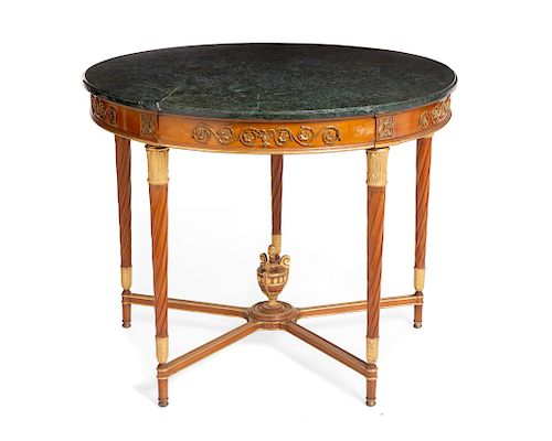 A Louis XVI style fruitwood center table