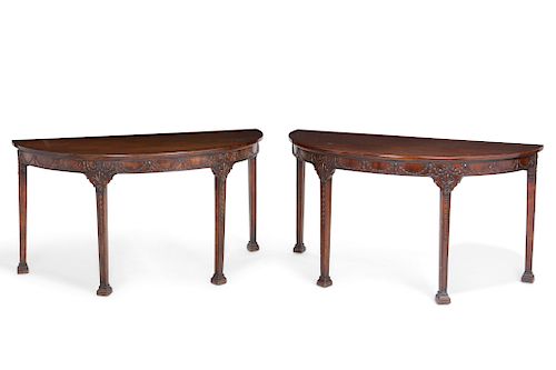 A pair of George III style mahogany side tables