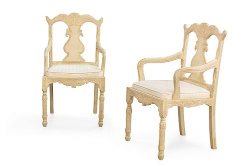 A pair of Anglo-Indian painted hardwood armchairs