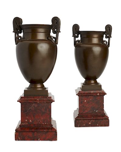 Pair of Frenchbronze and marble urns on pedestals