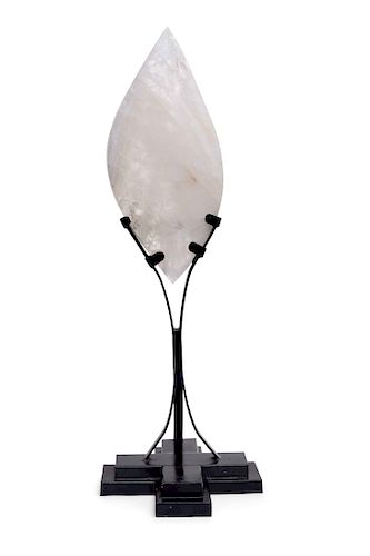 A contemporary rock crystal sculpture on stand