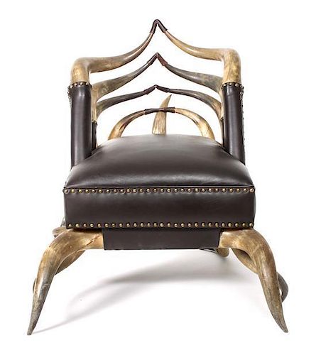 A Victorian Horn Chair Height 31 1/2 x width 29 x depth 29 1/2 inches.