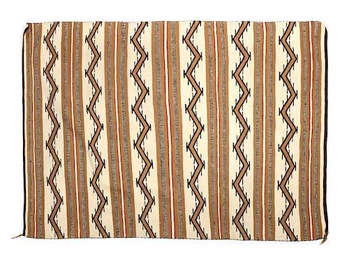 Four Navajo Rugs First: 63 1/2 x 49 inches.