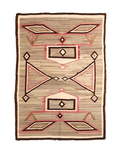Four Navajo Rugs First: 66 1/2 x 46 1/2 inches.