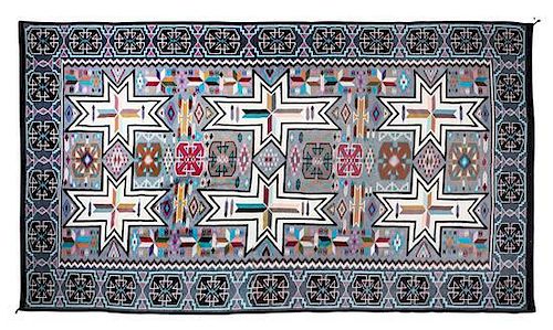 A Large Navajo Contemporary Teec Nos Pos Rug, Lilly Bitsuie 143 1/2 x 97 1/2 inches.