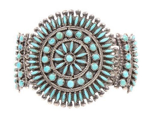 A Zuni Petit Point Cluster Bracelet Length 5 1/2 x opening 1 x width 2 inches.