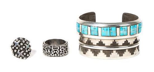 A Southwestern Style Silver and Turquoise Bracelet Length 5 5/8 x opening 1 1/8 x width 1 1/2 inches.