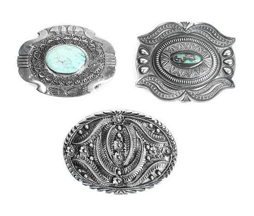 Three Southwestern Silver and Turquoise Belt Buckles Height of first 2 1/2 x 3 1/4 inches for a 1 1/2 inch belt.