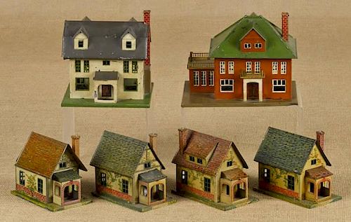 Six Lionel tin houses, to include four #184 Bunga