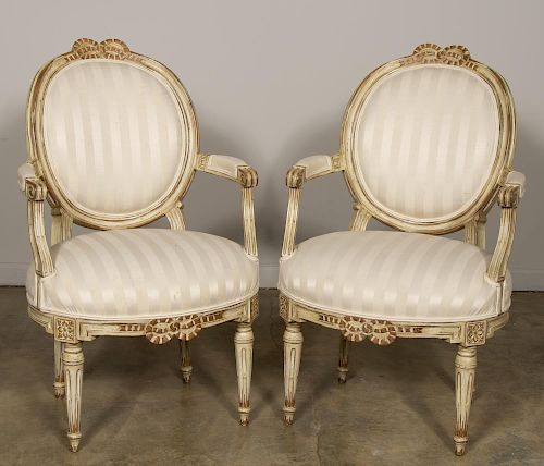 Pair of Louis XVI French Carved Open Arm Fauteuils