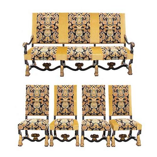 Lote de 5 piezas. Francia. Siglo XX. En talla de madera de roble. Consta de: sofá de 3 plazas y 4 sillas. Soportes con ruedas.