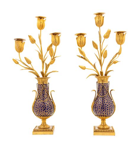 A Pair of Continental Gilt Bronze and Enameled Porcelain Three-Light Candelabra