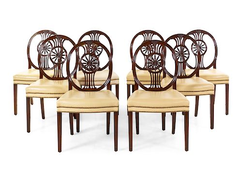 A Set of Eight Regency Style Carved Mahogany Leather-Upholstered Dining Chairs