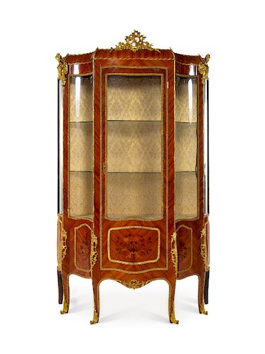 A Louis XV Style Gilt Bronze Mounted Marquetry Decorated Mahogany Vitrine