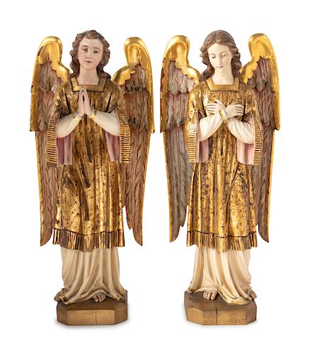 A Pair of Italian Painted and Parcel Gilt Figures of Angels