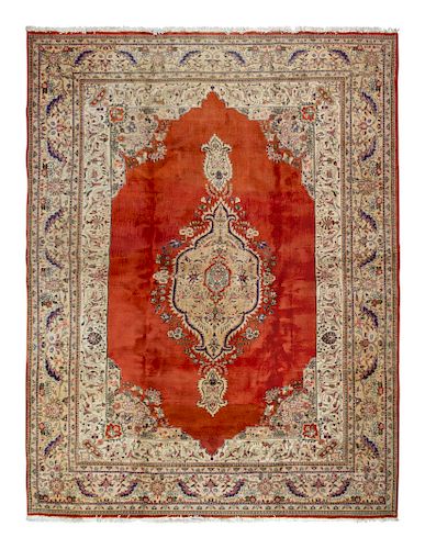 A Tabriz Wool Rug
12 feet 2 1/2 inches x 9 feet 9 inches. 