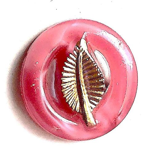 A PAIR OF PIERCED LEAF MOONGLOW BUTTONS