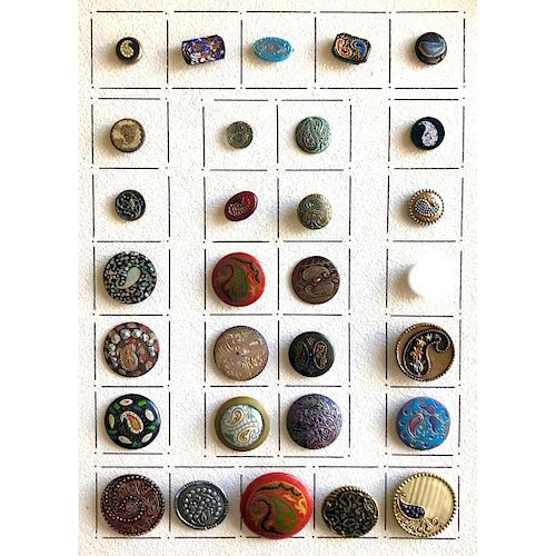 A CARD OF PAISLEY DESIGN BUTTONS IN ASSORTED MATERIALS