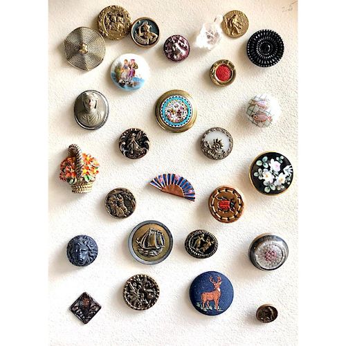 A LARGE CARD OF ASSORTED MATERIAL BUTTONS