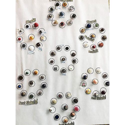 CARD OF DIMINUTIVE BUTTONS IN ASSORTED MATERIALS