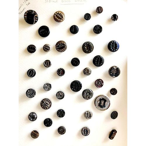 1 CARD OF BLACK GLASS PICTORIAL BUCKLE BUTTONS