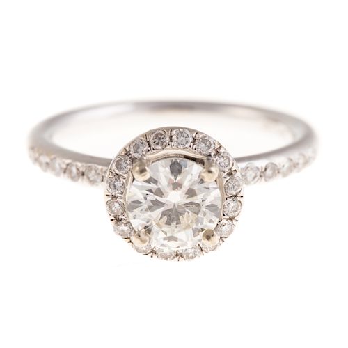 A Ladies 1.04ct Diamond Halo Engagement Ring