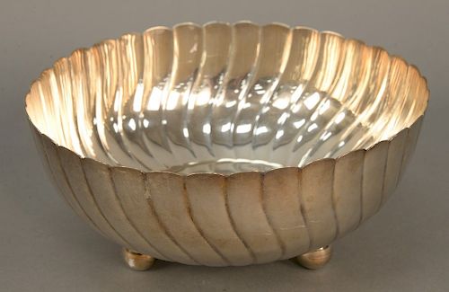 Mexican sterling footed bowl, having scallop sides on three ball feet, marked Mexico sterling 925 Zane. height 3 3/4 inches, diameter 8 inches, 15.4 t