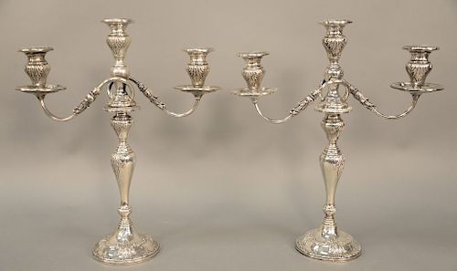 Pair of Frank Whiting sterling silver candelabras, having three lights, each weighted. height 17 inches.