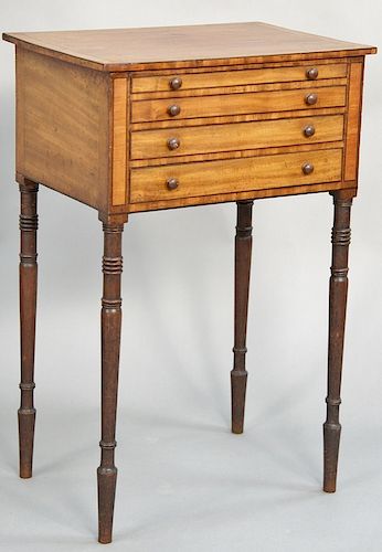 Sheraton mahogany and satinwood work table, having four graduated drawers set on tapered and turned legs. height 28 3/4 inches, top: 19" x 13 1/2".