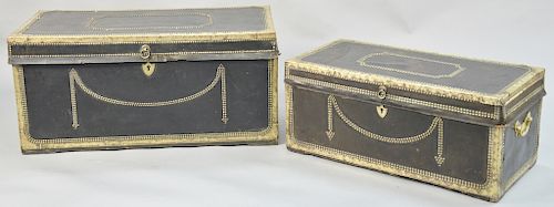 Two near matching camphorwood chests, having lift top with leather and brass trim and tacks. height 19 1/2 inches, and 15 1/2 inches, top: 21" x 41 1/