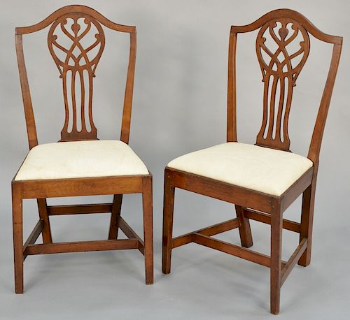 Pair of Federal cherry side chairs, with pierced carved backs, slip seats set on square tapered legs. height 39 1/2 inches, length 16 3/4 inches.