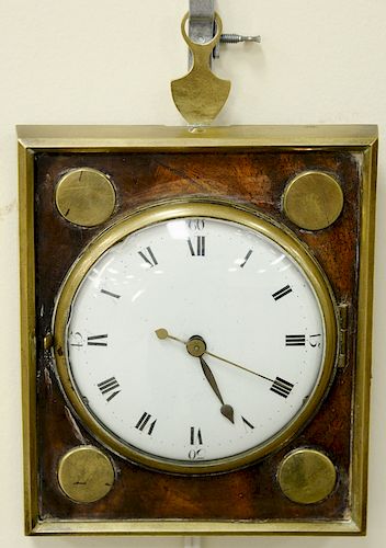 Continental wall clock on mahogany panel with brass surround and four brass circles, early to mid 19th century. height 6 1/2 inches, width 5 1/2 inche