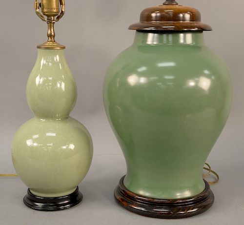 Two green glazed vases, China 19th/20th century, one green enamel of baluster shape, with a wooden cover and the other a celadon double gourd (hulupin