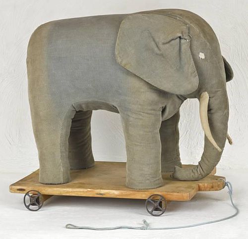 Elephant pull toy, early 20th c., 16 1/2'' h., 18''