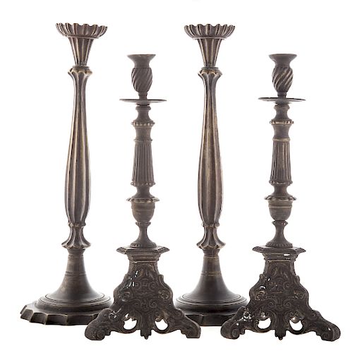 Two Pairs of Bronze Candlesticks