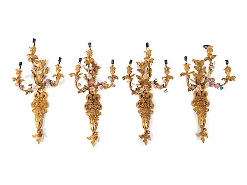 A Set of Four Neoclassical Porcelain Mounted Gilt Bronze Sconces