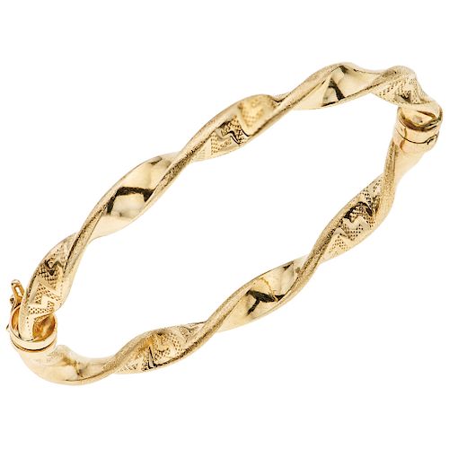 A yellow gold 14 K bracelet.