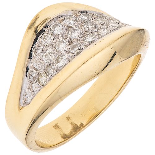 A yellow gold 18 K ring with diamonds.