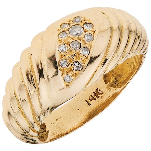 A yellow gold 14 K ring with diamonds.