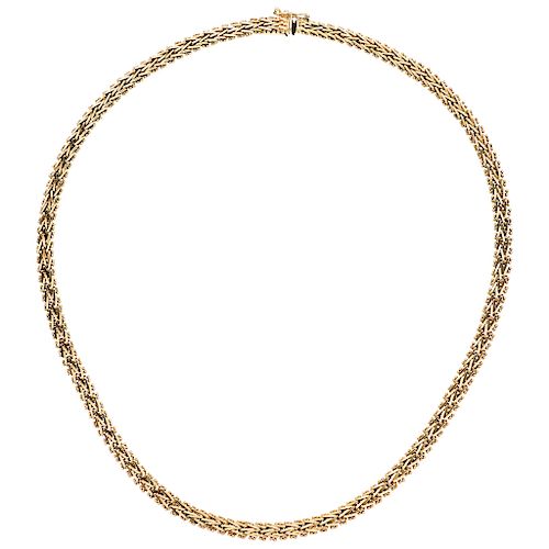 A yellow gold 14 K necklace.