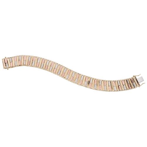 An Italian design yellow, white and pink gold 14 K bracelet.