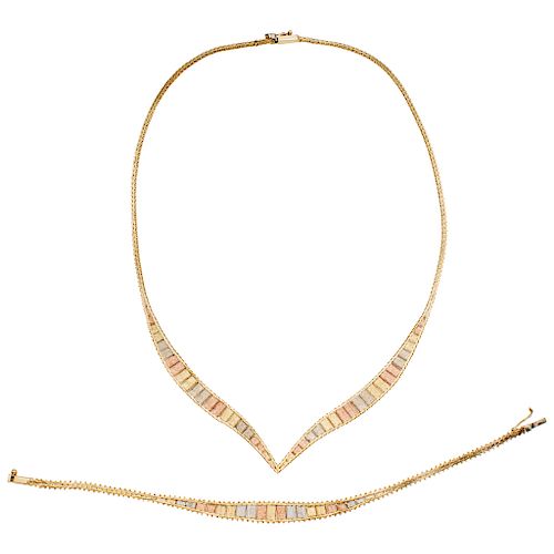 An Italiand design yellow, white and pink gold 14 K choker and bracelet set.