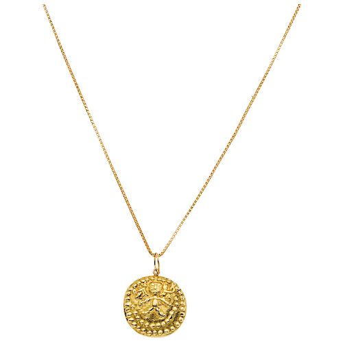 A yellow gold 18 K choker and pendant.