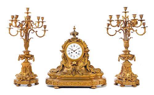 A French Gilt Bronze Clock Garniture